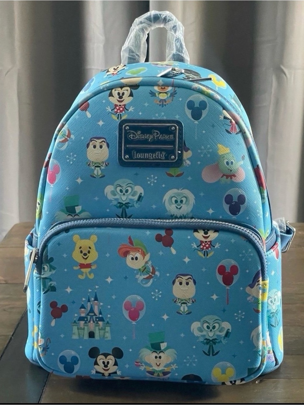 Loungefly Disney parks characters backpack